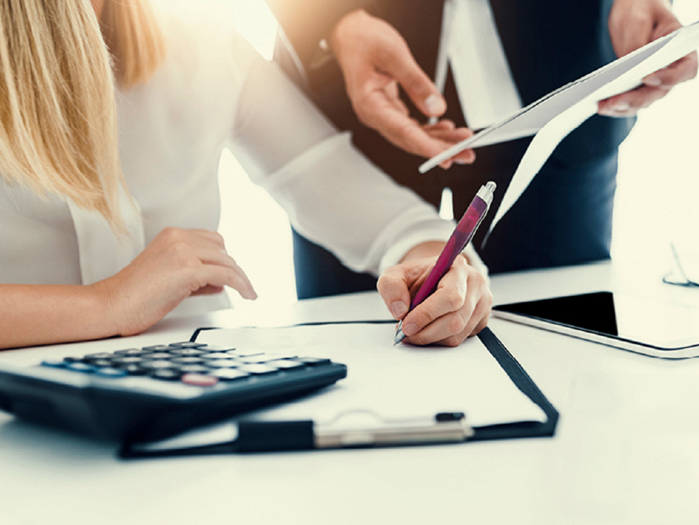 Woman writing down notes