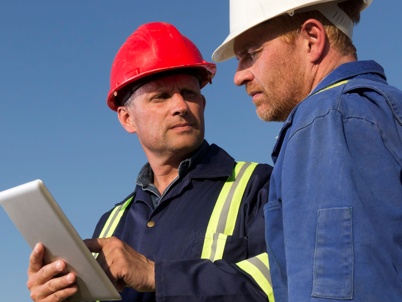 Maintenance workers in discussion