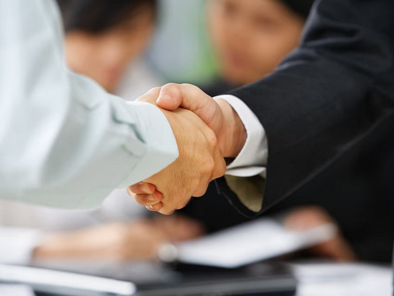 Two people shaking hands