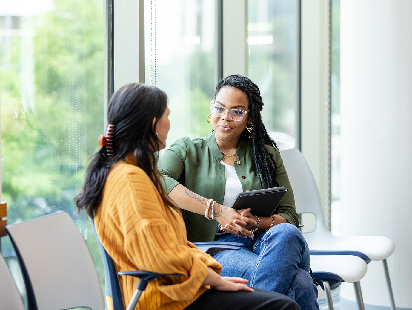 Two ladies having a discussion in the reception