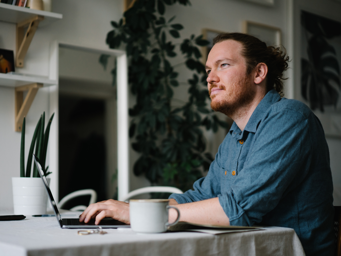 Man working in front of the laptop