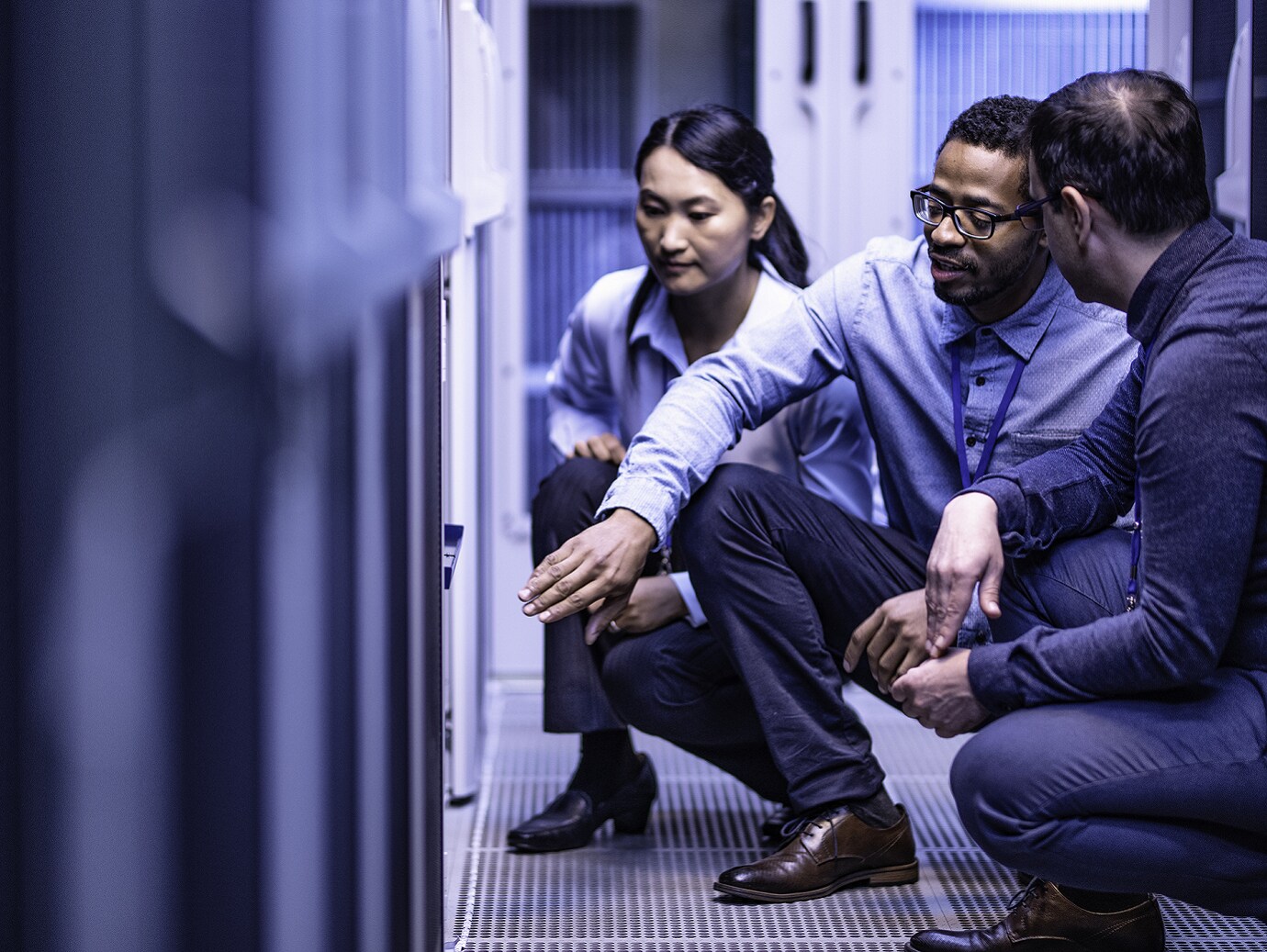 Three colleagues in discussing